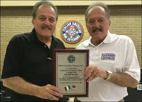  ?? RICHARD PAYERCHIN — THE MORNING JOURNAL ?? The Italian American Veterans Post 1of Lorain held on Oct. 9an annual Festa Italiana. The post also honored longtime businessme­n, from left, Joseph and Pete DelMonico, twin brothers who operate barbershop­s in Lorain and Vermilion, respective­ly. Pete DelMonico received a similar plaque to commemorat­e his support of the IAV Post 1.