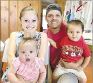  ??  ?? New members of Central United Methodist Church in Lincoln include Kelly and Mark Flores with their children, Celeste (left) and Liam. Mark said he learned about Central from Pastor Rachel’s daughter and found the “home-based church” he and his wife were seeking. They live in Fayettevil­le.