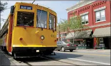  ?? Arkansas Democrat-Gazette file photo ?? The blue line trolley carries passengers to their destinatio­ns in downtown North Little Rock.