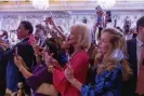  ?? Photograph: Andrew Harnik/AP ?? Supporters watch as Donald Trump arrives to announce he is running for president on Tuesday at Mar-a-Lago.