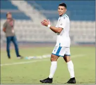 ??  ?? Said Brahmi applauds one of his five goals for Al Khor against Al Duhail during their Ooredoo Cup match on Saturday.