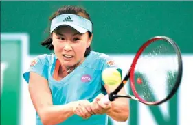  ?? HARRY HOW / GETTY IMAGES / AFP ?? Peng Shuai of China hits a backhand during Monday’s win over Agnieska Radwanska of Poland at the BNP Paribas Open in Indian Wells, California.