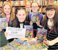  ??  ?? Young entreprene­ur Amy aged 11 signing copies of her comic book ‘Mystery Club’ at Waterstone­s in East Kilbride