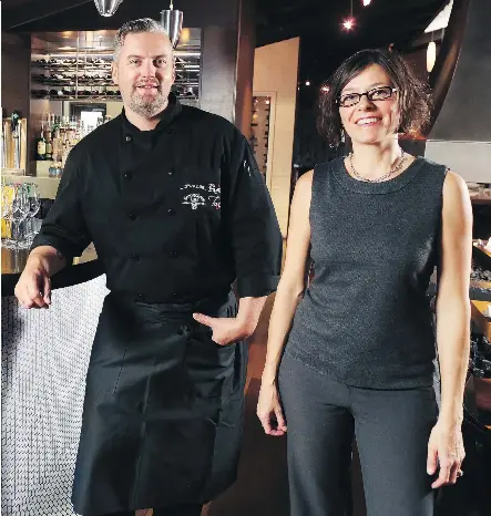  ?? GAVIN YOUNG ?? Smugglers Group general manager Andrea Cintula Scott with chef Greg Hennessey at the new Tango Bistro on MacLeod Trail.