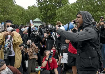  ?? GETTY ?? Star Wars actor John Boyega
makes an impassione­d speech at a Black Lives Matter rally in London.