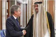  ?? EVELYN HOCKSTEIN/POOL PHOTO VIA AP ?? U.S. Secretary of State Antony Blinken, left, shakes hands with Qatar’s Emir Sheikh Tamim Bin Hamad Al Thani on Sunday at Lusail Palace in Lusail, Qatar.