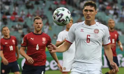  ??  ?? Denmark’s Andreas Christense­n stays focused during the 2-1 quarter-final victory over the Czech Republic which has set up the meeting with England. Photograph: Ozan Köse/AFP/Getty Images