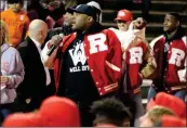  ?? Jeremy Stewart / RN-T ?? Former Rome High and Notre Dame linebacker Toryan Smith pumps up the crowd at a community pep rally for the Rome football team at Barron Stadium on Thursday.