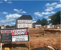  ?? Staff photo by Andrew Bell ?? ■ Townhouses are under constructi­on at 330 N. Pecan St. in Nash, Texas. City Administra­tor Doug Bowers said the project, and a related one at 60 Clark St., will help to accommodat­e the city’s growing population.