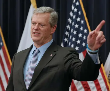  ?? ANGELA ROWLINGS / HERALD STAFF FILE ?? PUMPED UP: Gov. Charlie Baker has dug in on a climate-change package that would boost gas prices as much as 17 cents a gallon in its first year. Below, traffic crowds the Mass Pike.