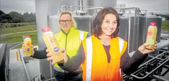  ?? PHOTO: PAUL TAYLOR ?? Ross Beaton, founder and managing director, with Sally Gallagher, head of innovation and strategy, at Hawke’s Bay Apple Press in Whakatu, near Hastings.