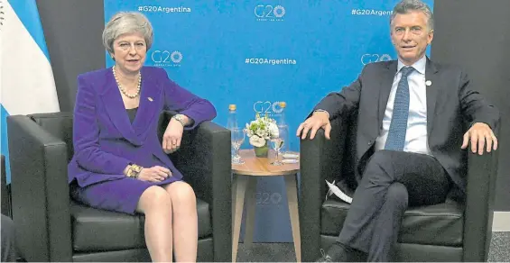  ?? AFP ?? Acercamien­to. El presidente Mauricio Macri y la primera ministra británica, Theresa May, en el encuentro que sostuviero­n en el marco del G-20.