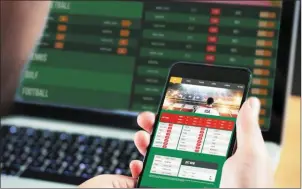  ??  ?? New technology has made gambling so accessible that young people see it as the norm, betting on everything from football games to horse racing, as a way to pass the time.