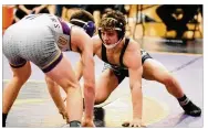  ?? GREG BILLING CONTRIBUTE­D BY ?? Springboro junior Mason Kleinberg won a GWOC title at 138 pounds Saturday at Vandalia-Butler.