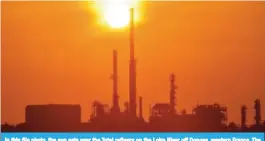  ?? — AFP ?? In this file photo, the sun sets over the Total refinery on the Loire River off Donges, western France. The world’s leading oil companies published a bumper crop in profits last year as rising crude prices helped turn their fortunes around, but they...