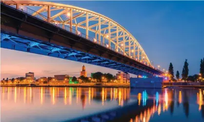  ??  ?? Road bridge over the Rhine at Arnhem. Photograph: Henk Meijer/Alamy Stock Photo