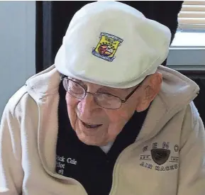  ?? MEG JONES / MILWAUKEE JOURNAL SENTINEL ?? Richard Cole is the last surviving member of Doolittle’s Raiders. He received a standing ovation as he waved to a crowd Wednesday. See more photos at jsonline.com/news.