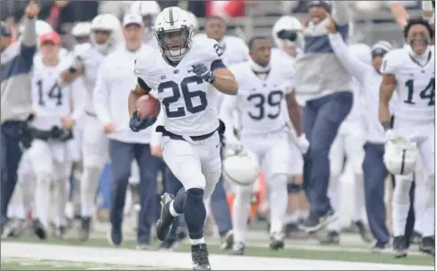  ?? Jamie Sabau/Getty Images ?? Penn State running back Saquon Barkley returns the opening kickoff 97 yards for a touchdown in the first quarter against the Ohio State Buckeyes Oct. 28 at Ohio Stadium in Columbus, Ohio.