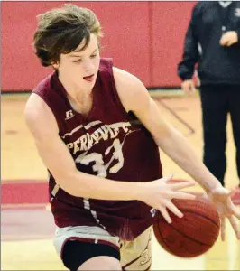  ??  ?? Perryville junior Malik Craton grabs a loose ball.