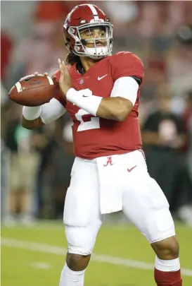  ?? (Photo by Brynn Anderson, AP) ?? Alabama quarterbac­k Jalen Hurts sets back to pass against LSU on Saturday.