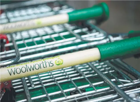  ?? Picture: AAP IMAGE ?? RETAIL GAINS: Woolworths reported a 10 per cent spike in food sales for the third quarter, primarily as a result of panic buying amid the coronaviru­s pandemic. Coles on Wednesday announced a 13 per cent jump.