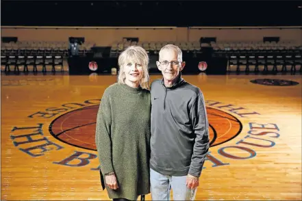  ?? [BRYAN TERRY/THE OKLAHOMAN] ?? David Glover and his wife Cyndy have become the faces of the state tournament­s in State Fair Arena. Both beat cancer last year, making this year even more special.