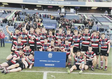  ??  ?? 2 The Stirling County players celebrate after winning the National Youth Under-18 Cupatbt Murrayfiel­d yesterday