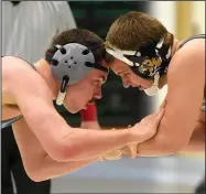  ?? File Photo/NWA Democrat-Gazette ?? Springdale Har-Ber’s Ben Fears (left) has found success in wrestling despite being diagnosed with autism. The senior, who finished third at 170 pounds last season, is a Class 6A-7A state title contender this season at 182.