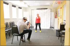  ??  ?? In this March 17, 2020 photo, dance instructor Lola Jaramillo records a Zumba and exercise lesson in Washington, that will be uploaded in the social media accounts of Vida
Senior Center, a non-profit that serves Washington’s older Hispanic community. (AP)