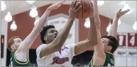  ?? JOHN BLAINE — FOR THE TRENTONIAN ?? Rider’s Frederick Scott, center, averaged 12.1points per game last season, but vowed he’s a more confident player ahead of next month’s opener.