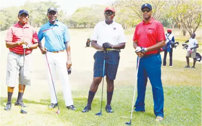 ??  ?? Golfers pose for a photo shot before the tee off of the Save Lives Charity Golf Tournament at the IBB Internatio­nal Golf and Country Club in Abuja last year