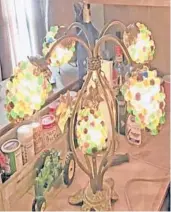  ?? READER SUBMITTED/TNS ?? Although it’s whimsical and attractive, does the damage hurt this lamp?