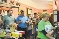  ??  ?? Supporters gather to recognize the World first Benzodiaze­pine Awareness Day in Connecticu­t on July 11 at the Act Natural Health and Wellness store on Water Street.