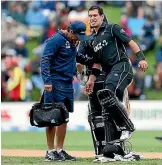  ?? PHOTO: GETTY IMAGES ?? Ross Taylor grimaces in pain during his match-winning 181 not out against England on Wednesday.