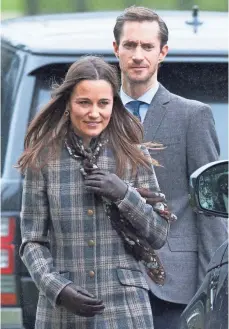  ??  ?? Pippa Middleton and James Matthews visit St. Mark’s Church in Bucklebury, West Berkshire, England, on Dec. 25, 2016. The couple will be married at the church on Saturday. SAMIR HUSSEIN, WIREIMAGE