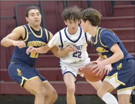  ?? ?? Aptos High's Isaiah Ackerman battles with Soquel's Cade Peterson as he defends the Knights' ball handler in the SCCAL Tournament semis at Scotts Valley High on Thursday.