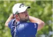  ?? THE ASSOCIATED PRESS ?? Marc Leishman watches his tee shot on the fourth hole during Friday’s second round of the BMW Championsh­ip.