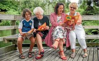  ?? PHOTO: GRANT MATTHEW ?? Checking out what’s coming up at WOMAD are family members, from left, Nikau Kopu, Mary Sweney-Black, Bry Kopu and Jean Black.