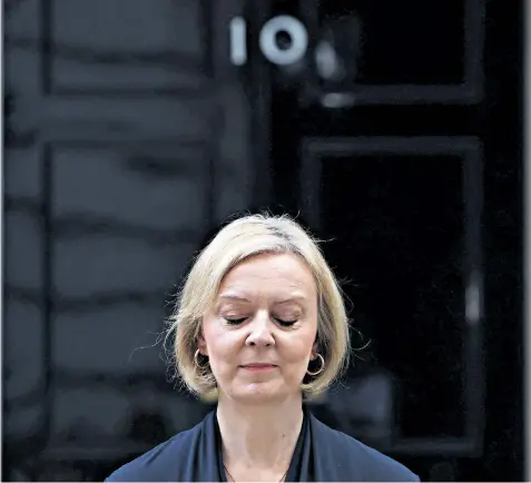  ?? ?? Liz Truss announced her resignatio­n outside No 10 on Thursday, above. With her husband, Hugh O’Leary, at the Tory party conference, below right