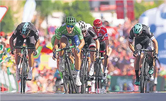  ?? Getty Images ?? Matteo Trentin won the 13th stage of the Vuelta a Espana — his third stage win of the race. Chris Froome retained his overall lead, after finishing seventh.