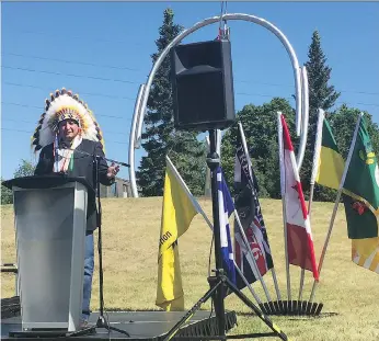  ?? ALEXA LAWLOR ?? Saskatoon Tribal Council Chief Mark Arcand speaks Wednesday at the unveiling in Victoria Park of “The Coming Spring,” a Reconcilia­tion commemorat­ive artwork by Canadian artist Gordon Reeve. “We know the history (of treaty) and many of those stories,”...