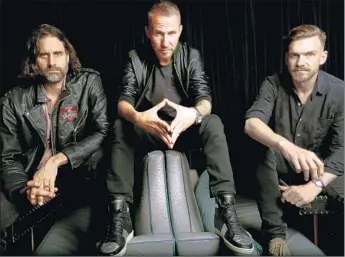  ?? Francine Orr Los Angeles Times ?? ELECTRO-POP group Miike Snow is Andrew Wyatt, left, Christian Karlsson and Pontus Winnberg. “We’re painting a picture, and the picture is what we want you to look at, not us,” said Karlsson.