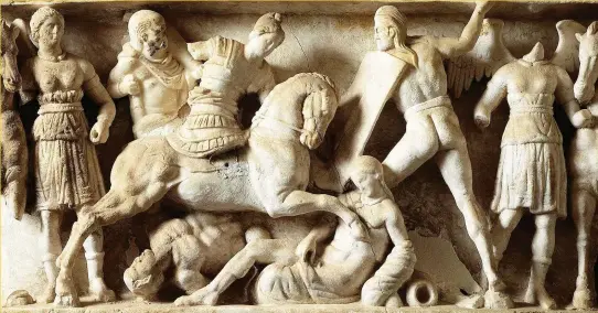  ??  ?? Artwork on an alabaster funerary urn depicts Romans and Gauls at war. Julius Caesar used alleged British support for Rome’s Gaulish enemies as a pretext for launching an assault on the mysterious island at the edge of Europe
