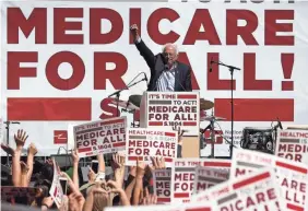  ?? JUSTIN SULLIVAN/GETTY IMAGES ?? Sen. Bernie Sanders says his Medicare for All plan would include dental and vision care and hearing aids in seniors’ coverage.