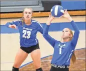  ?? Jeremy Stewart, file ?? Armuchee’s Kyleigh Powell sets the ball in front of Emily Tomlin during a 2019 match against Coosa.