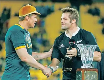  ?? ?? FORMER New Zealand captain Richie McCaw celebratin­g Jean de Villiers’s 100th Test for the Springboks, which showcases the respect between two great warriors and two great rugby nations.