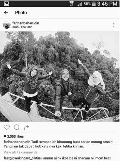  ??  ?? The group of teenagers who went viral after climbing the Ipoh signboard in Jalan Kuala Kangsar. — Bernama photo