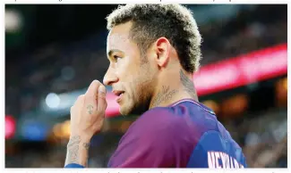  ??  ?? Paris Saint Germain’s Neymar looks on during their French League One soccer match between PSG and Olympique Lyon at the Parc des Princes stadium in Paris Sunday. (AP)
