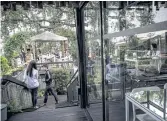  ??  ?? RURAL RETREAT: People relax at the eco-friendly Bangkok Tree House hotel in Bang Krachao.