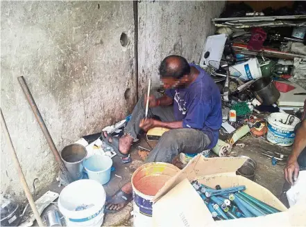  ?? – DR THENG LEE CHONG ?? Not the way: A ' backyard', or informal, e- waste recycler in Penang. This is not how we want such waste to be recycled as it could lead to both the recycler and the environmen­t being poisoned.